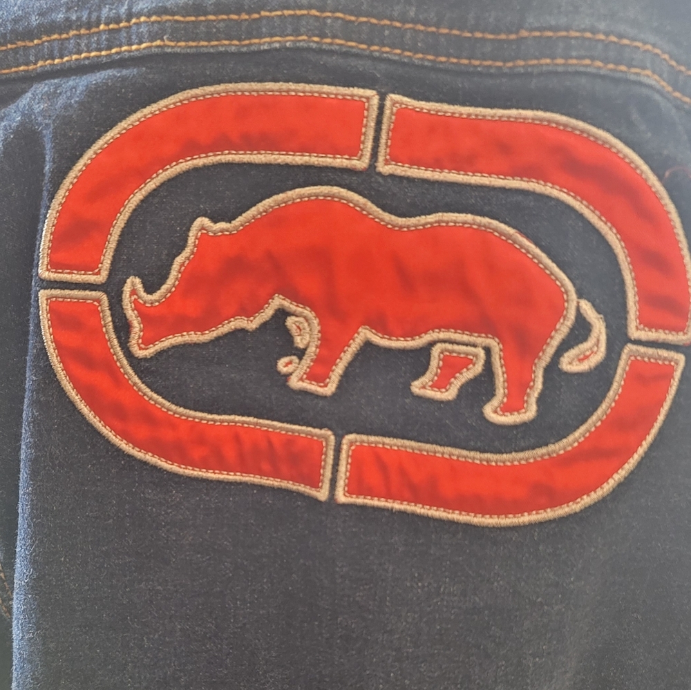 Vintage Echo Dark jean jacket w/ rhino on the back